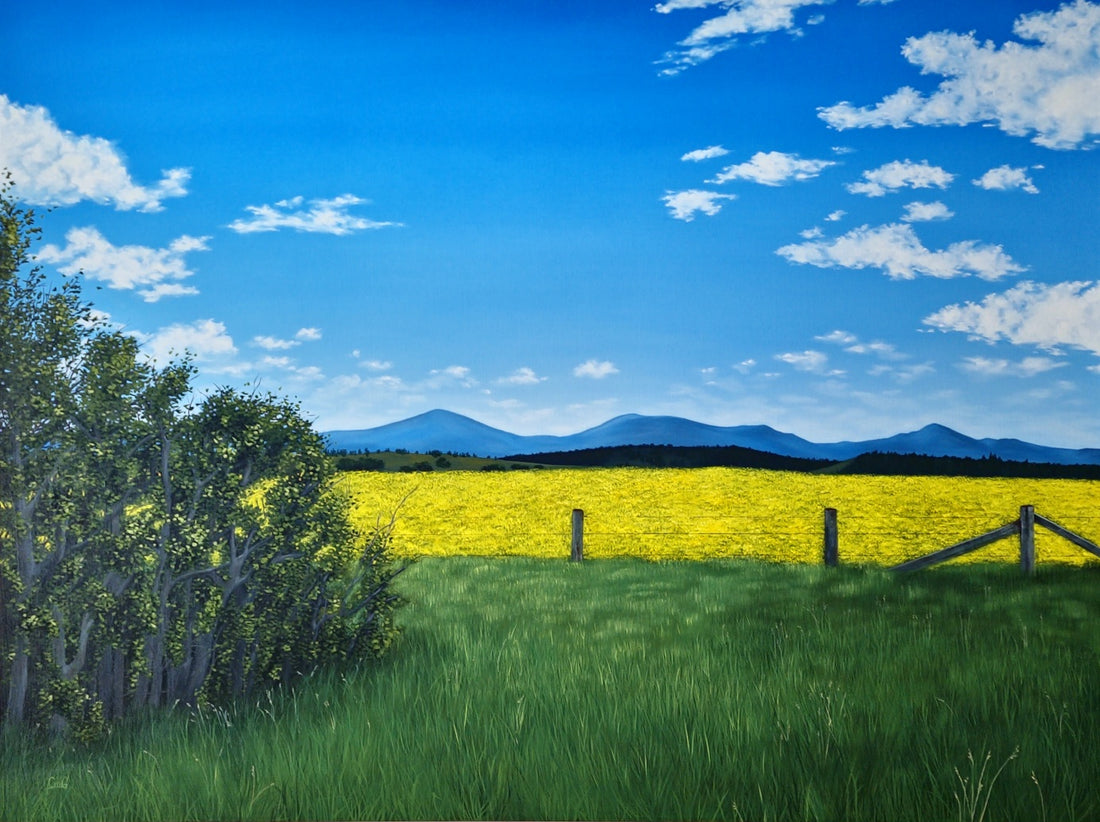 Rapeseed field or canola field landscape painting with mountains in background and fence and tree in foreground